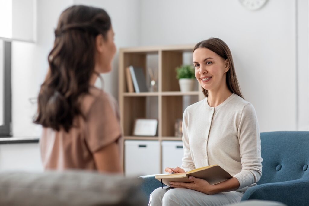 A woman enjoys individual therapy during treatment.