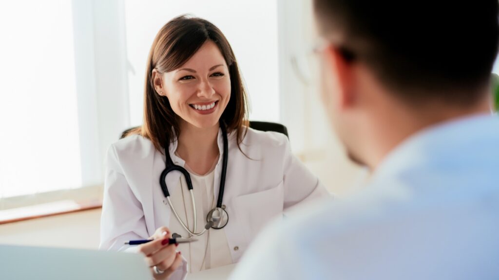 A doctor explains how long does alcohol withdrawal last to a client as he seeks help for his dependency.